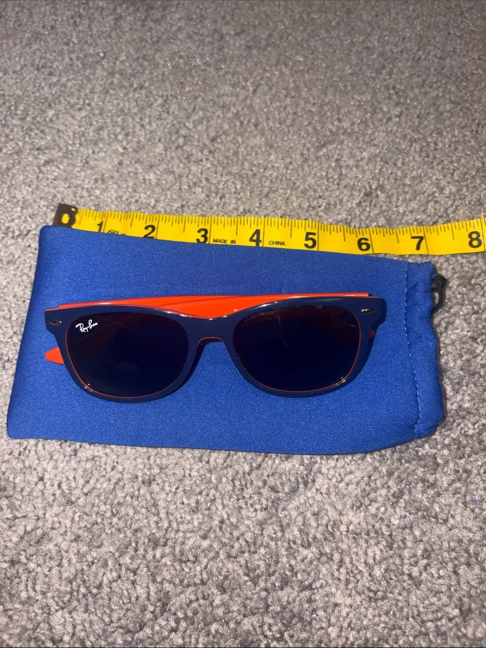 Small kid Ray Bans orange and navy